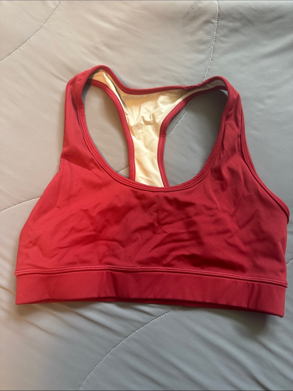 ZYIA Red Racerback Sports Bra with Cream Lining doesn’t have pads